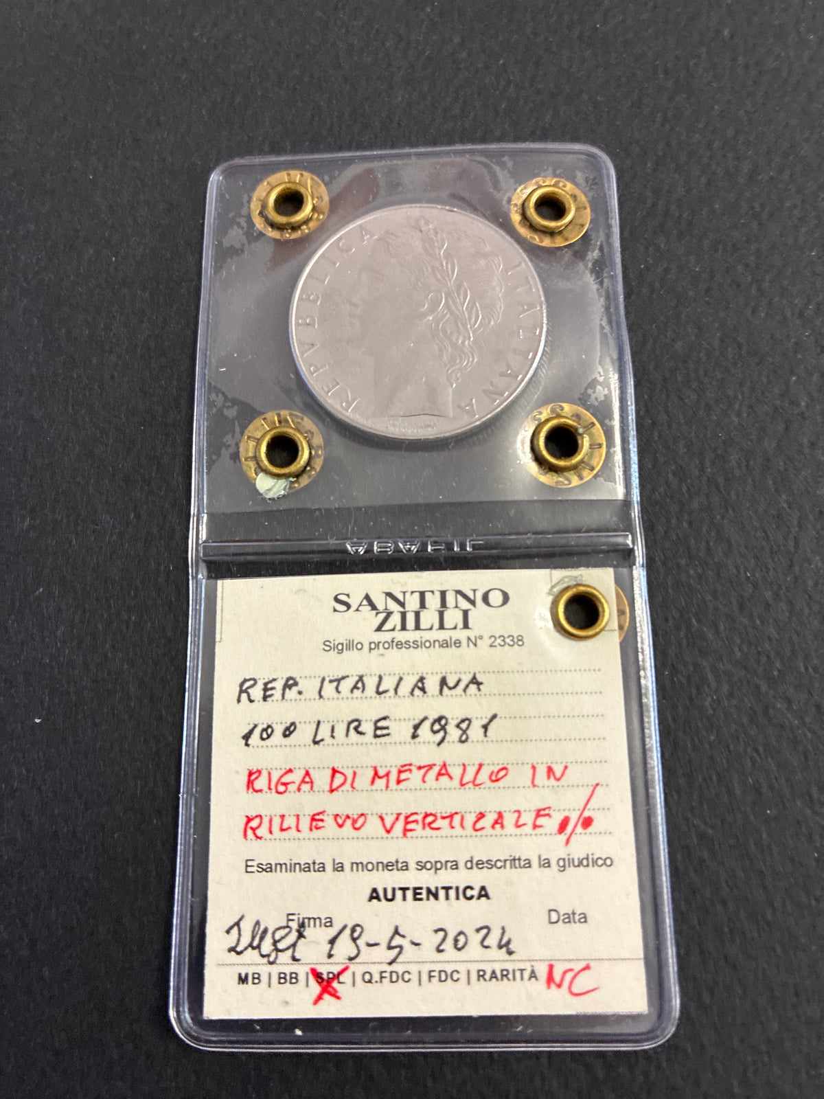Moneta periziata da 100 Lire 1981 Minerva - Variante con errori di conio "Riga di metallo in rilievo verticale e orizzontale" - Grado SPL / NC
