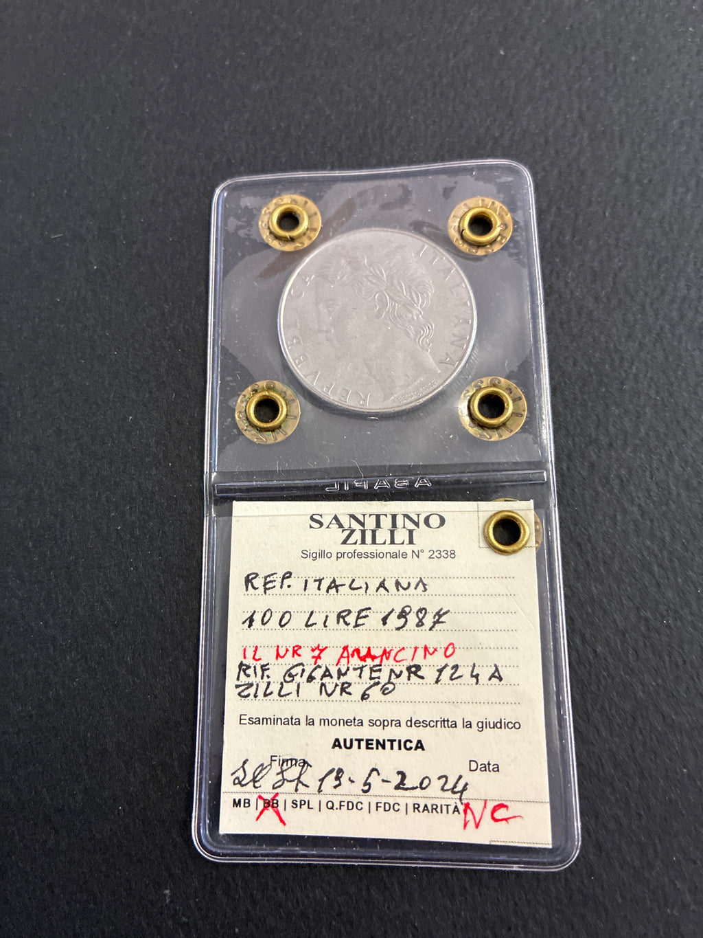 Moneta periziata da 100 Lire 1987 Minerva - Variante di conio "Il nr 7 a uncino" (Gigante 124a) - Grado BB / NC