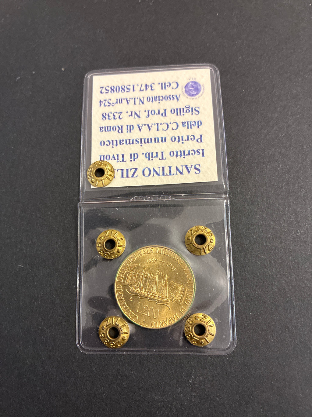 200 Lire Arsenale Taranto dell'89 Periziata con Errore di Conio Riga in Rilievo SPL