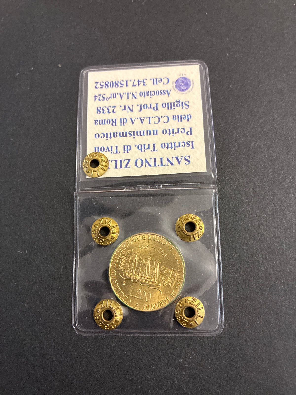 200 Lire Arsenale Taranto dell'89 Periziata con Errore di Conio Riga in Rilievo SPL
