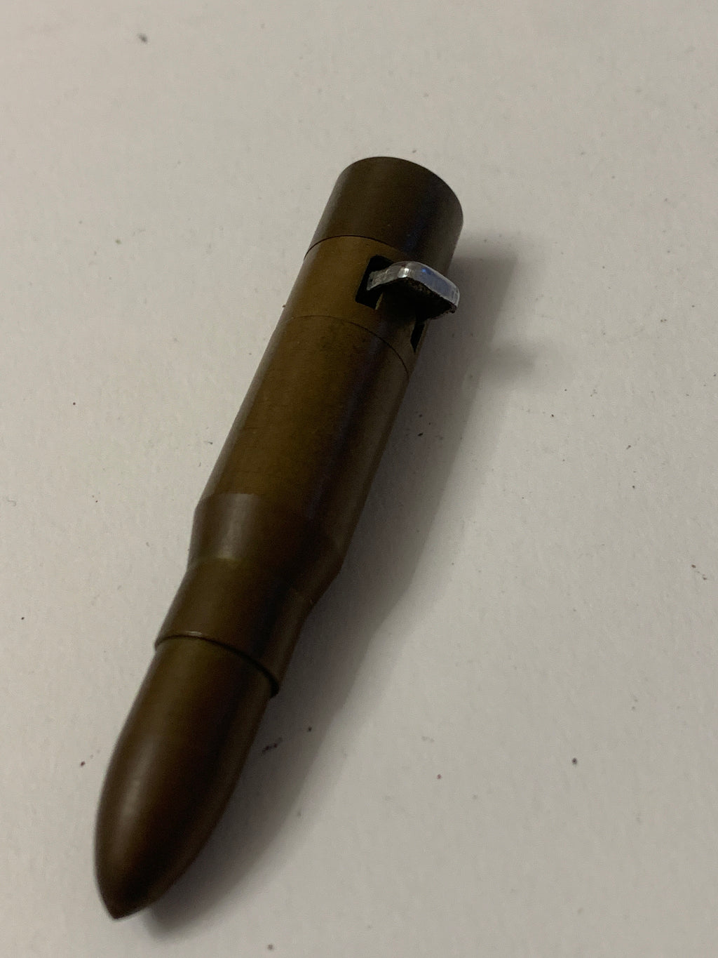 Accendino vintage a forma di proiettile in metallo dorato