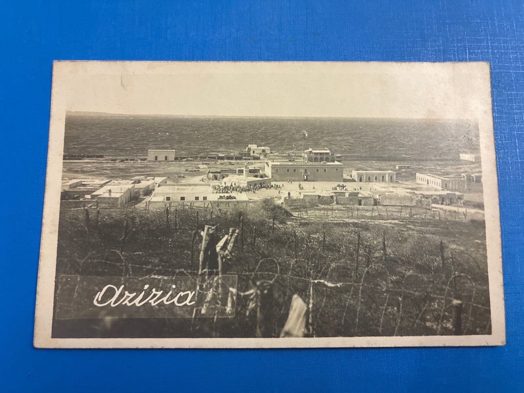 Cartolina postale italiana d'epoca coloniale del 1919 con veduta panoramica del fortino militare e del villaggio di Azizia in Libia.