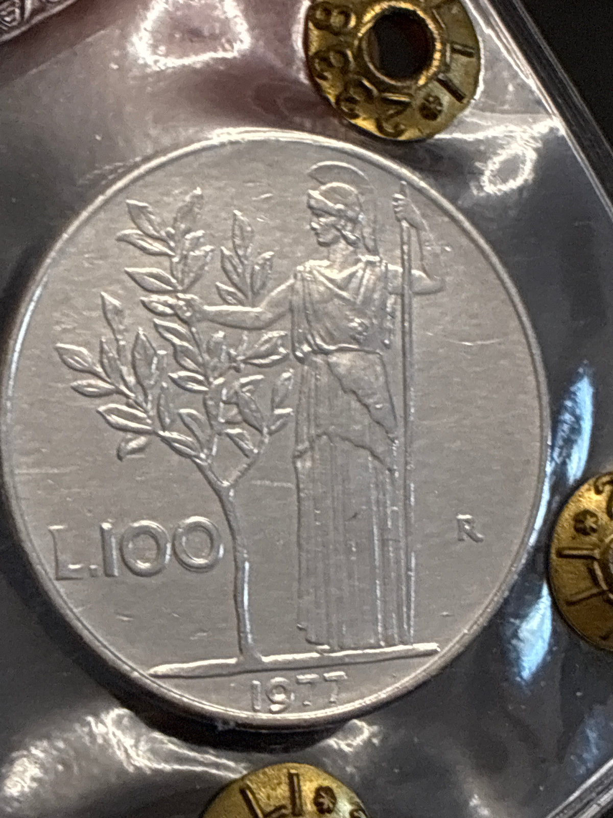 100 Lire 1977 "Slittamento del Tondello e Asse Ruotato 25°" - Periziata