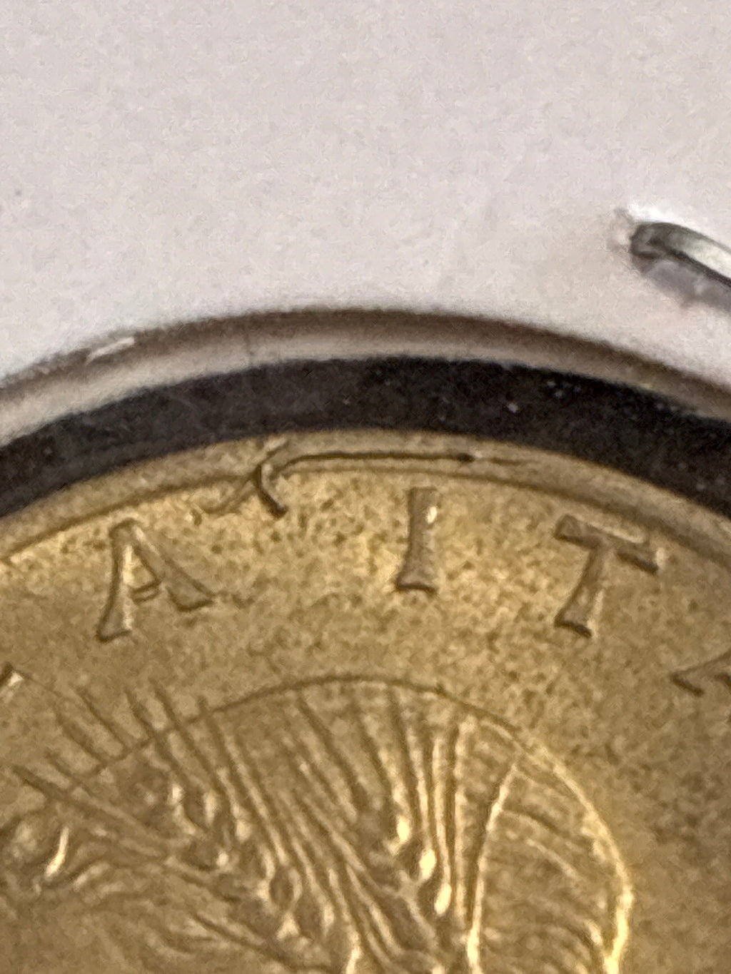 20 lire del 1985 Ramo di Quercia variante errore di conio rottura della grondaia con frammento trattenuto