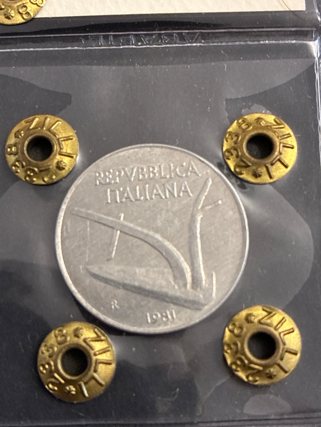 10 Lire Spiga dell'81 Periziata con Errore di Conio Asse Ruotato 45°