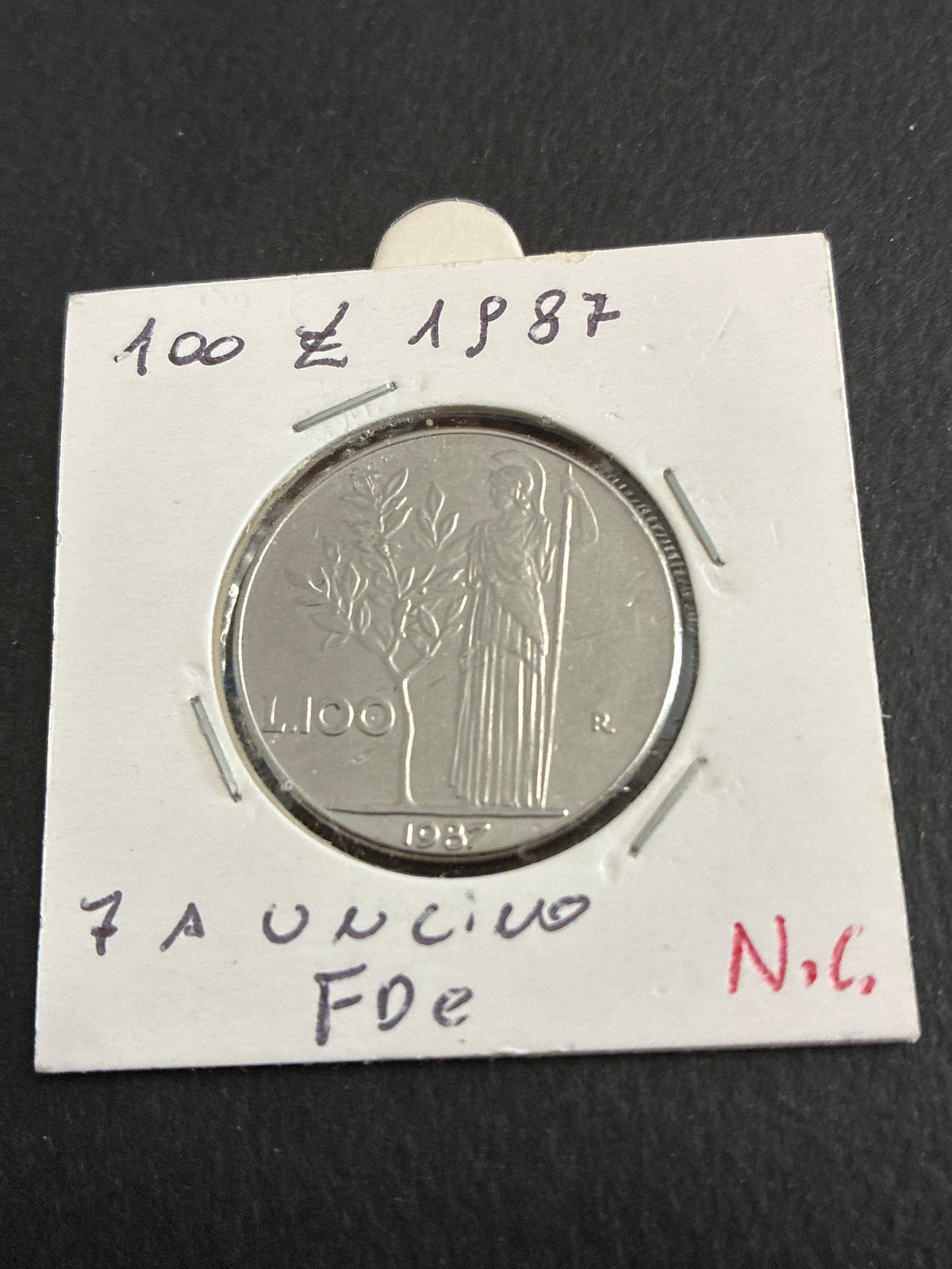 100 lire del 1987 Minerva variante errore di conio cifra 7 a uncino fdc nc