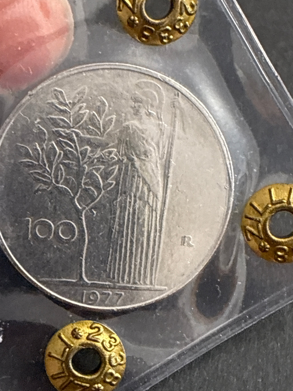 100 Lire 1977 "Slittamento del Tondello con Doppia Battuta" -