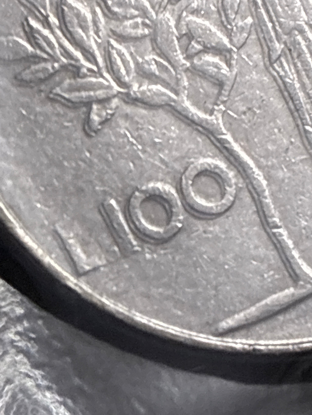 100 Lire 1977 "Slittamento del Tondello con Doppia Battuta" -