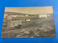 Cartolina postale italiana d'epoca coloniale con veduta dello scalo ferroviario e dei vagoni cisterna della ferrovia di Azizia in Libia