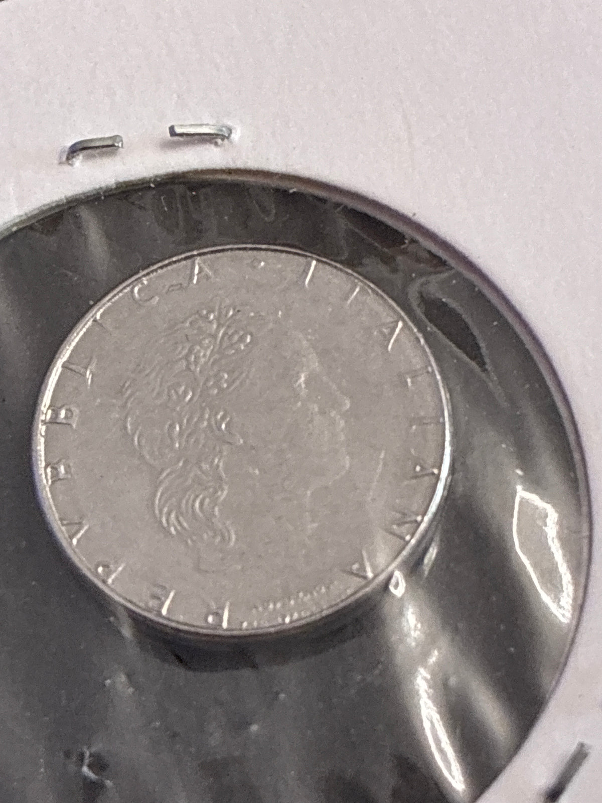 50 lire del 1991 Vulcano micro errore conio stanco manca data e dettagli testa e valore