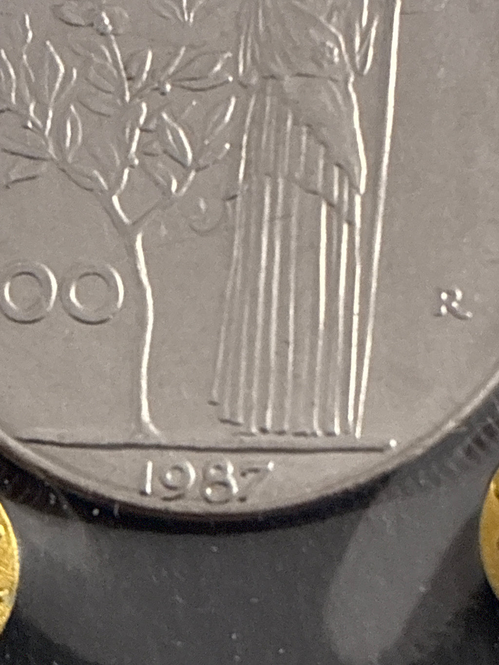 Moneta periziata da 100 Lire 1987 Minerva - Variante di conio "Il nr 7 a uncino" (Gigante 124a) - Grado SPL / NC