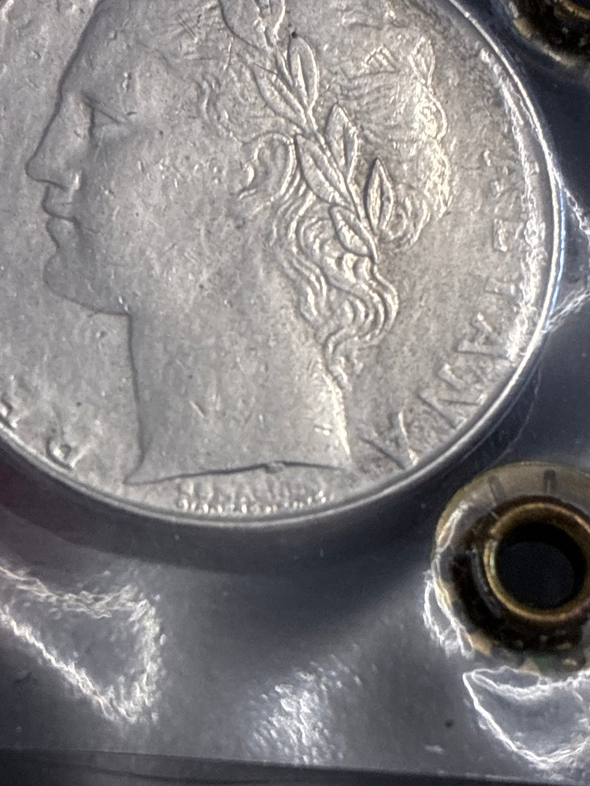 100 Lire 1981 Minerva Rara con Eccesso di Metallo a Mezzaluna Periziata