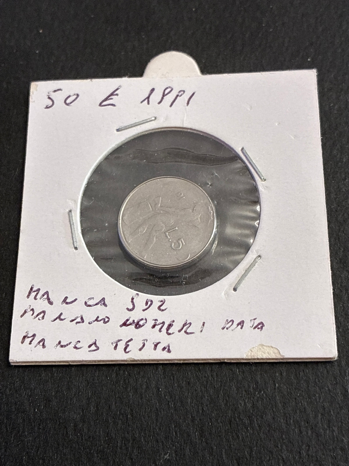 50 lire del 1991 Vulcano micro errore conio stanco manca data e dettagli testa e valore