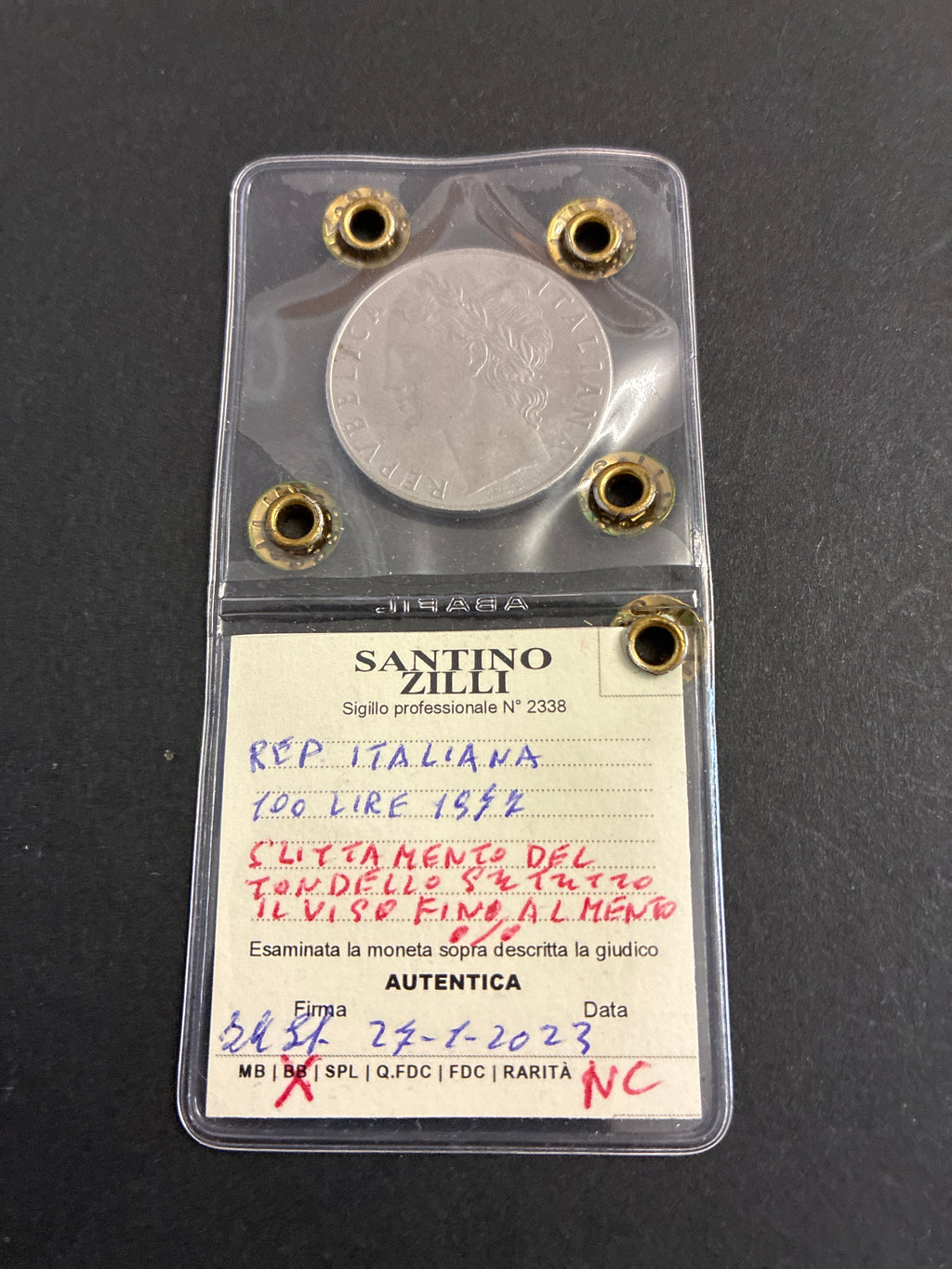 100 Lire 1977 "Slittamento del Tondello e Asse Ruotato 25°" - Periziata