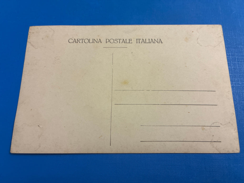 Cartolina postale italiana d'epoca coloniale con veduta panoramica del uadi e delle fortificazioni di Beni Ulid in Libia.