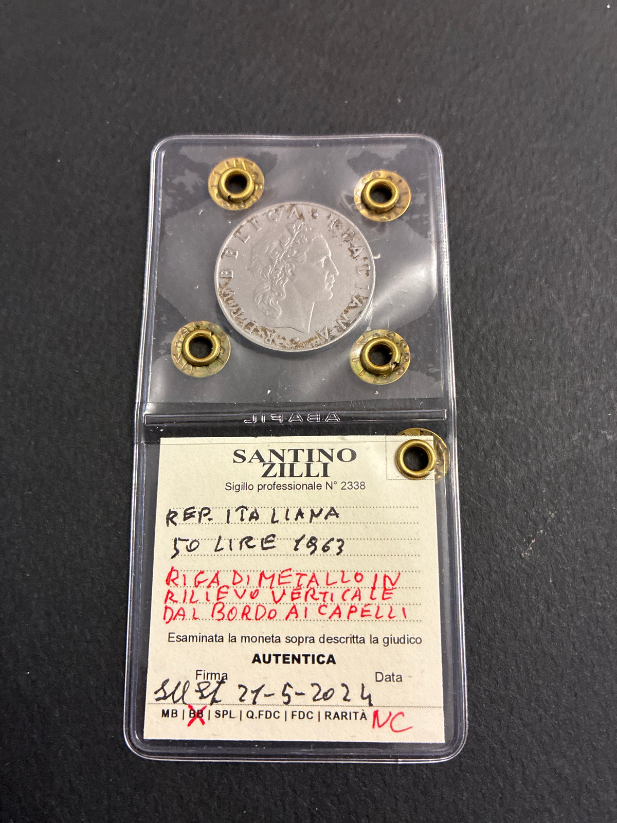 Moneta da 50 Lire 1963 Periziata Zilli - Errore di Conio: Riga di Metallo in Rilievo Verticale dal Bordo ai Capelli BB