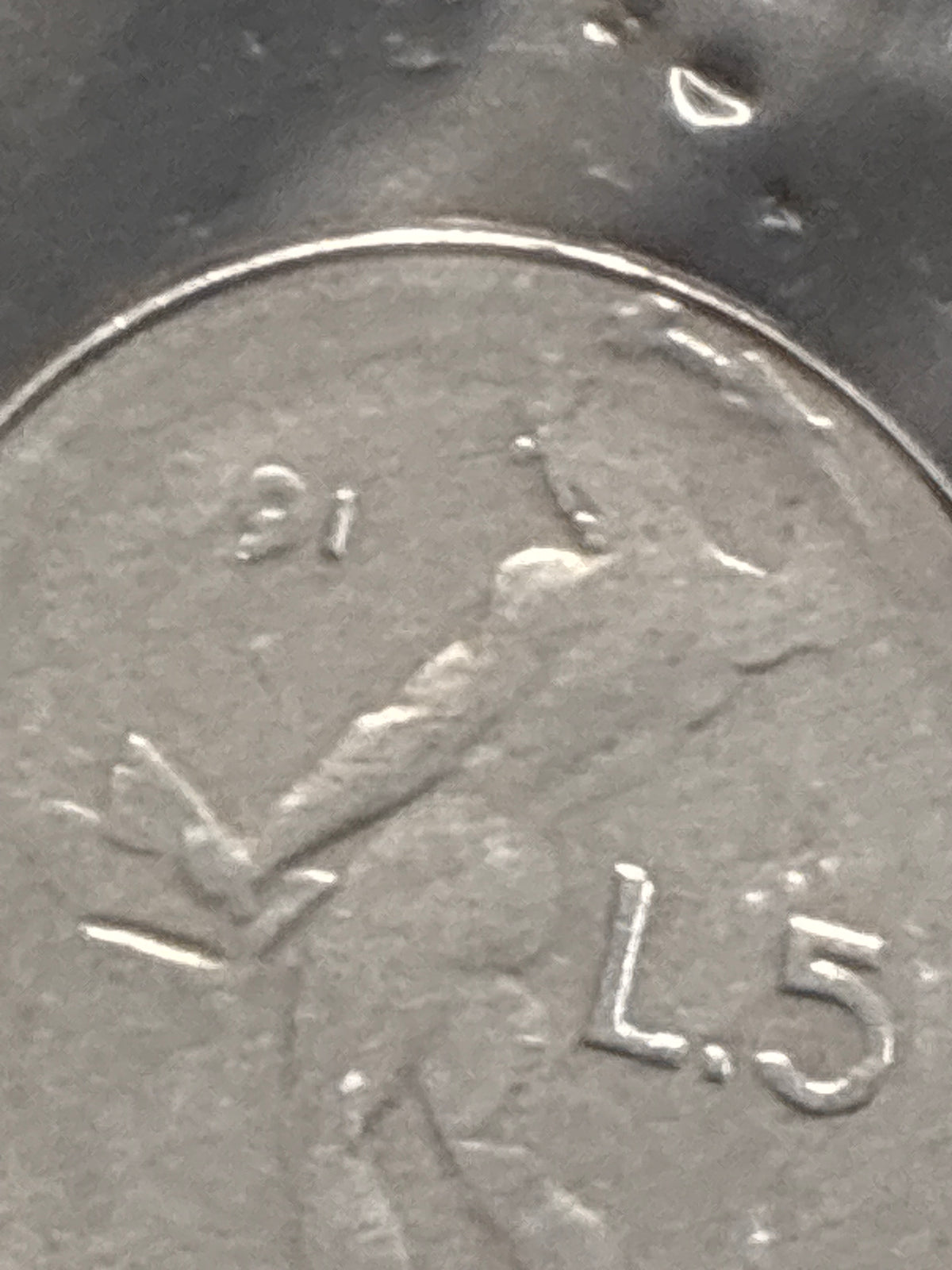 50 lire del 1991 Vulcano micro errore conio stanco manca data e dettagli testa e valore