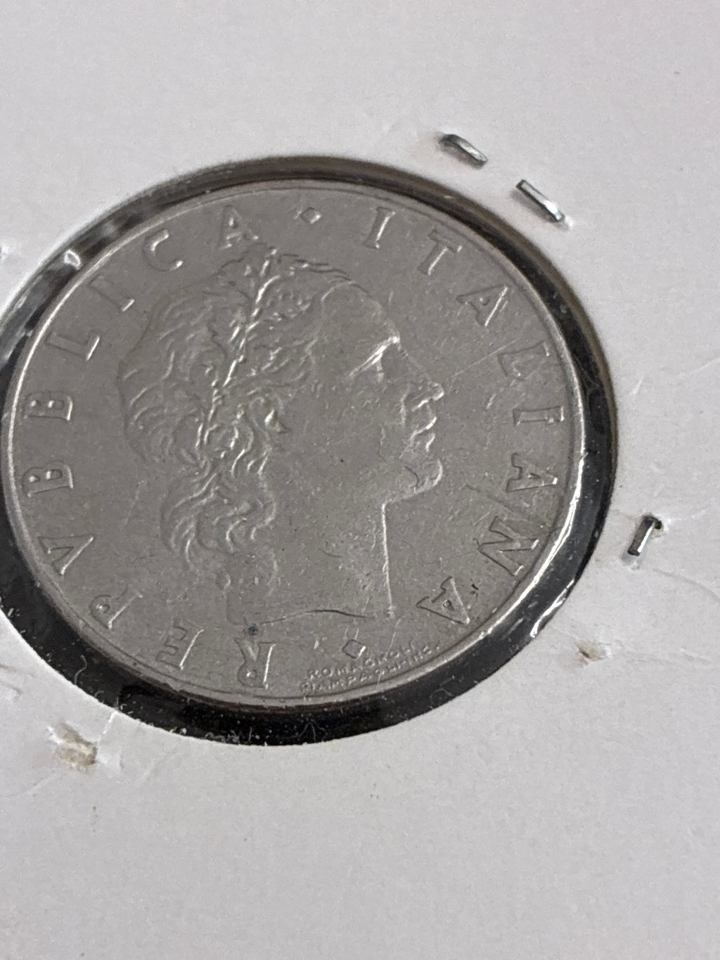 50 lire del 56 Vulcano con errore frattura di conio dall'incudine al bordo