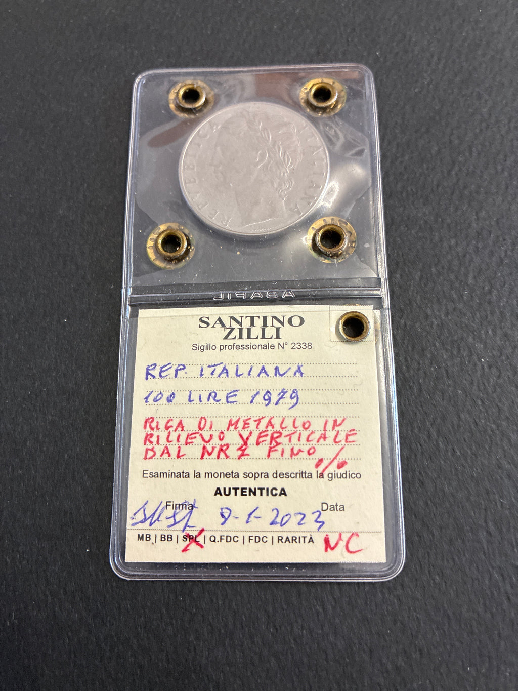 100 Lire 1979 Minerva con Riga di Metallo in Rilievo Verticale Periziata SPL