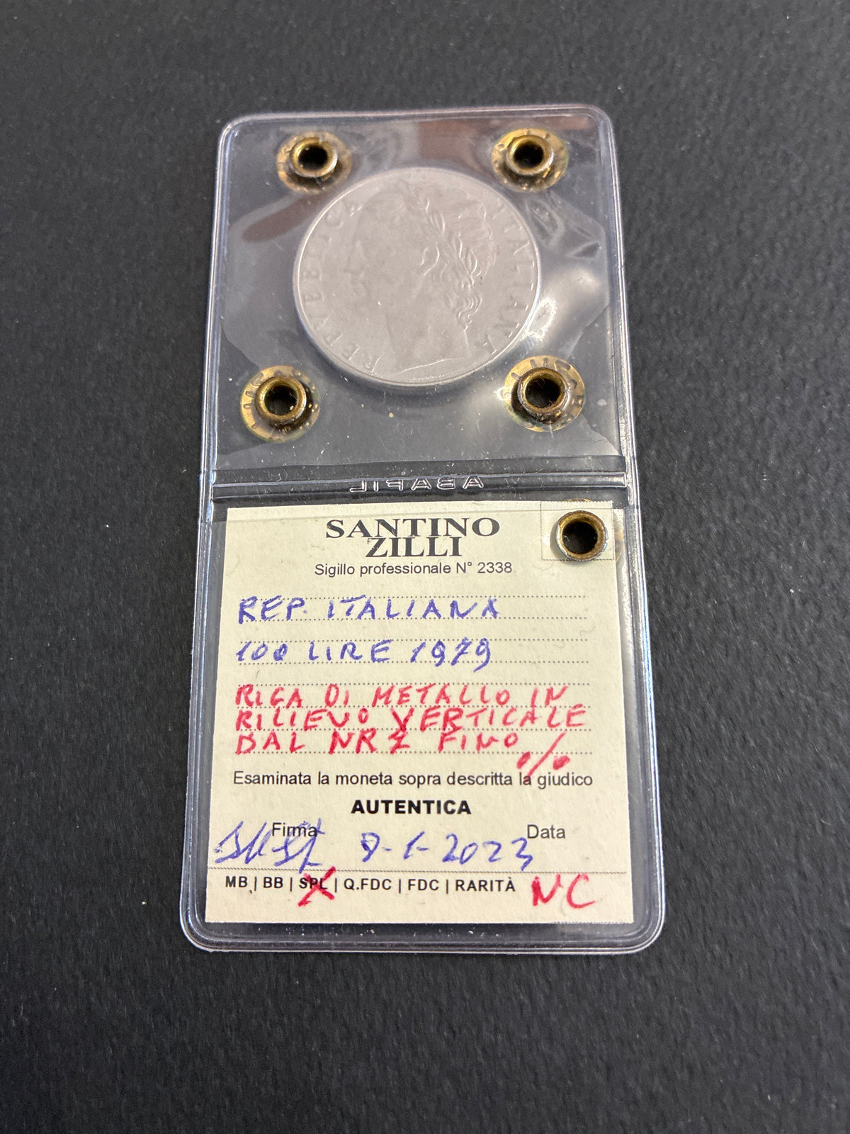 100 Lire 1979 Minerva con Riga di Metallo in Rilievo Verticale Periziata SPL