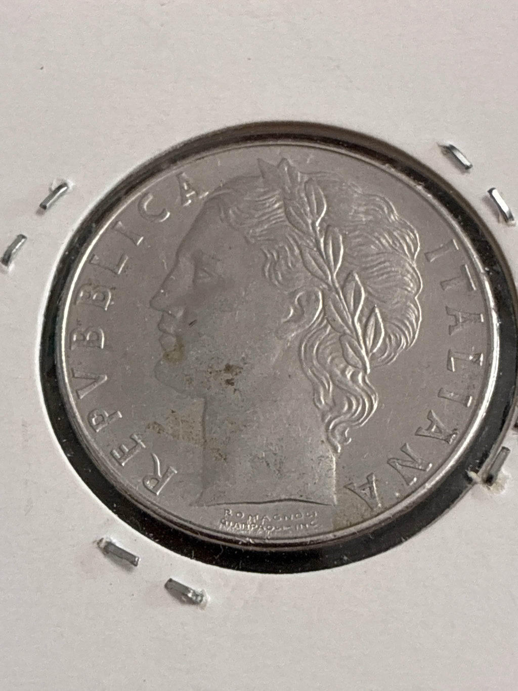 100 Lire 1977 Repubblica Italiana Minerva variante con errore di conio per esubero o mancanza di metallo tra i numeri della data