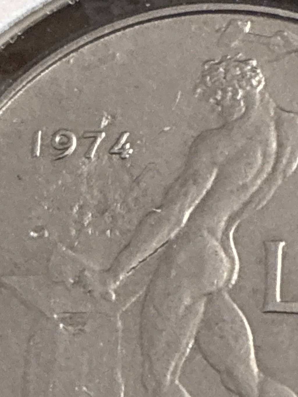 50 lire del 1974 Vulcano variante errore di conio con mancanza di metallo al rovescio