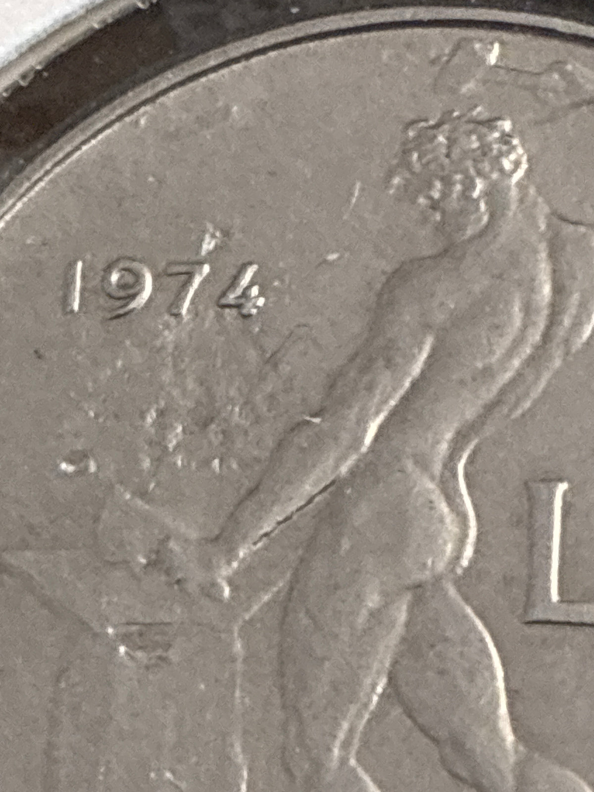 50 lire del 1974 Vulcano variante errore di conio con mancanza di metallo al rovescio