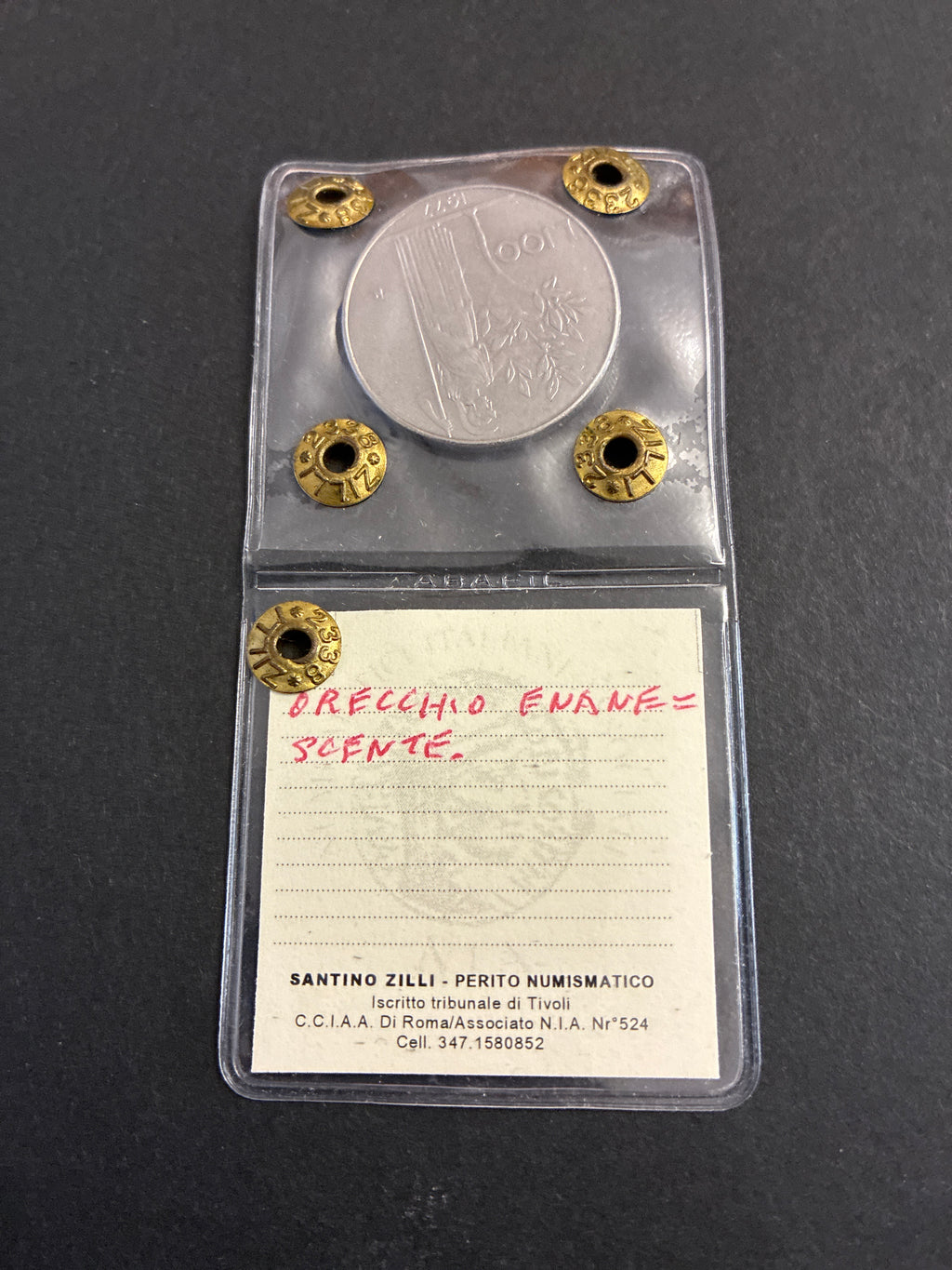 100 Lire 1977 "Mancano i Capelli Vicino l'Orecchio" - Periziata