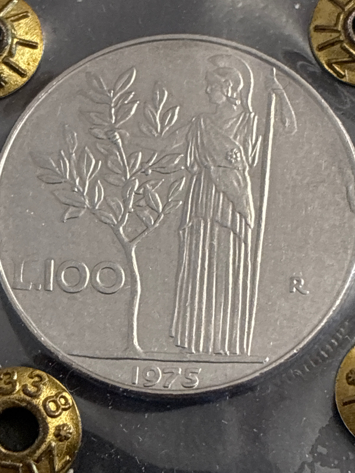 100 Lire 1975 Minerva con Eccesso di Metallo sul Bordo Periziata SPL