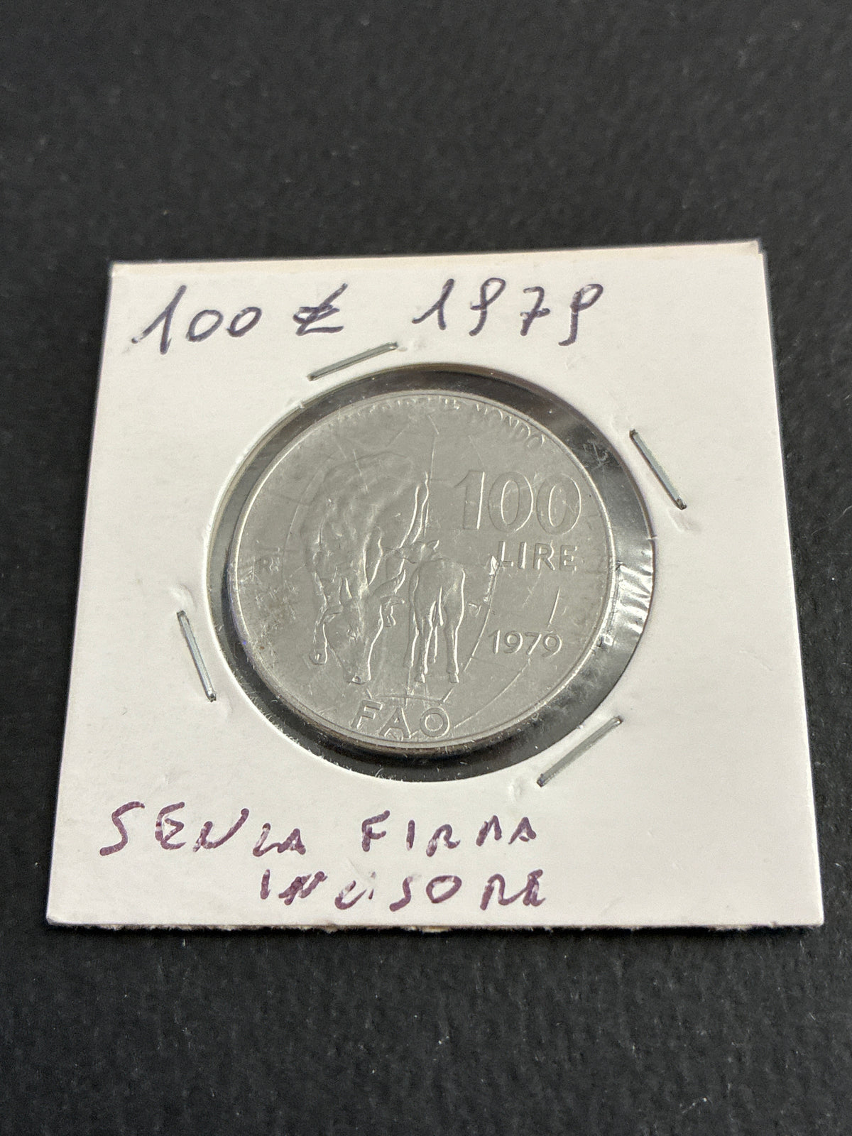 100 lire del 1979 FAO variante errore di conio senza firma incisore