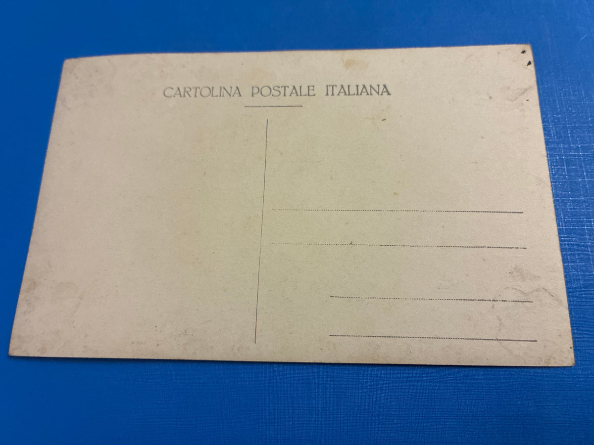 Cartolina postale italiana d'epoca coloniale del 1919 con veduta di Beni Ulid in Libia e indigeno locale in abiti tradizionali arabi.