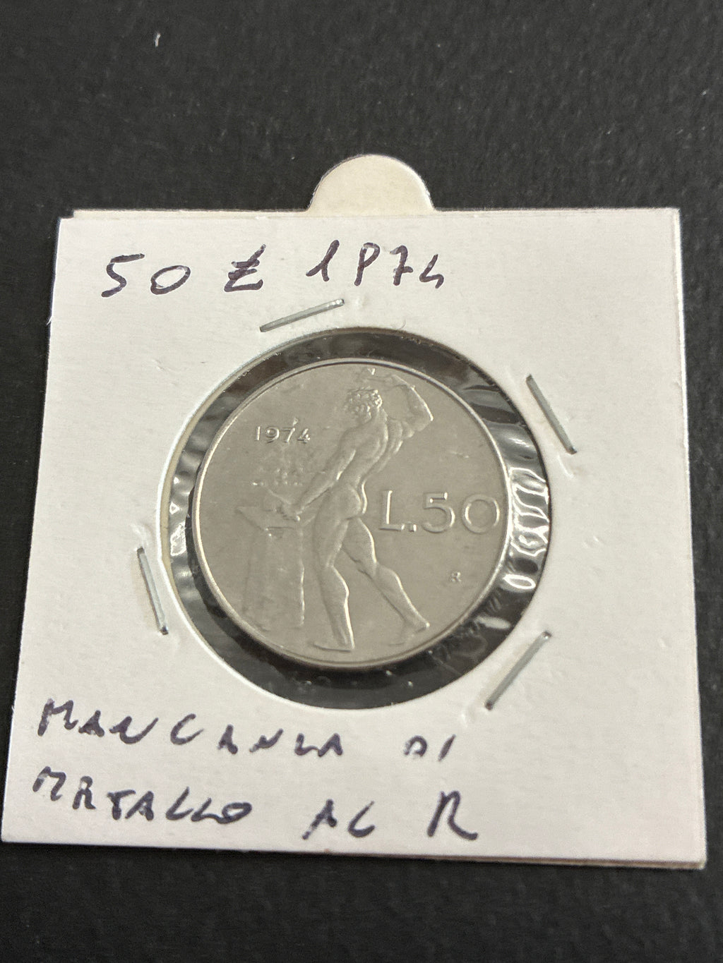 50 lire del 1974 Vulcano variante errore di conio con mancanza di metallo al rovescio
