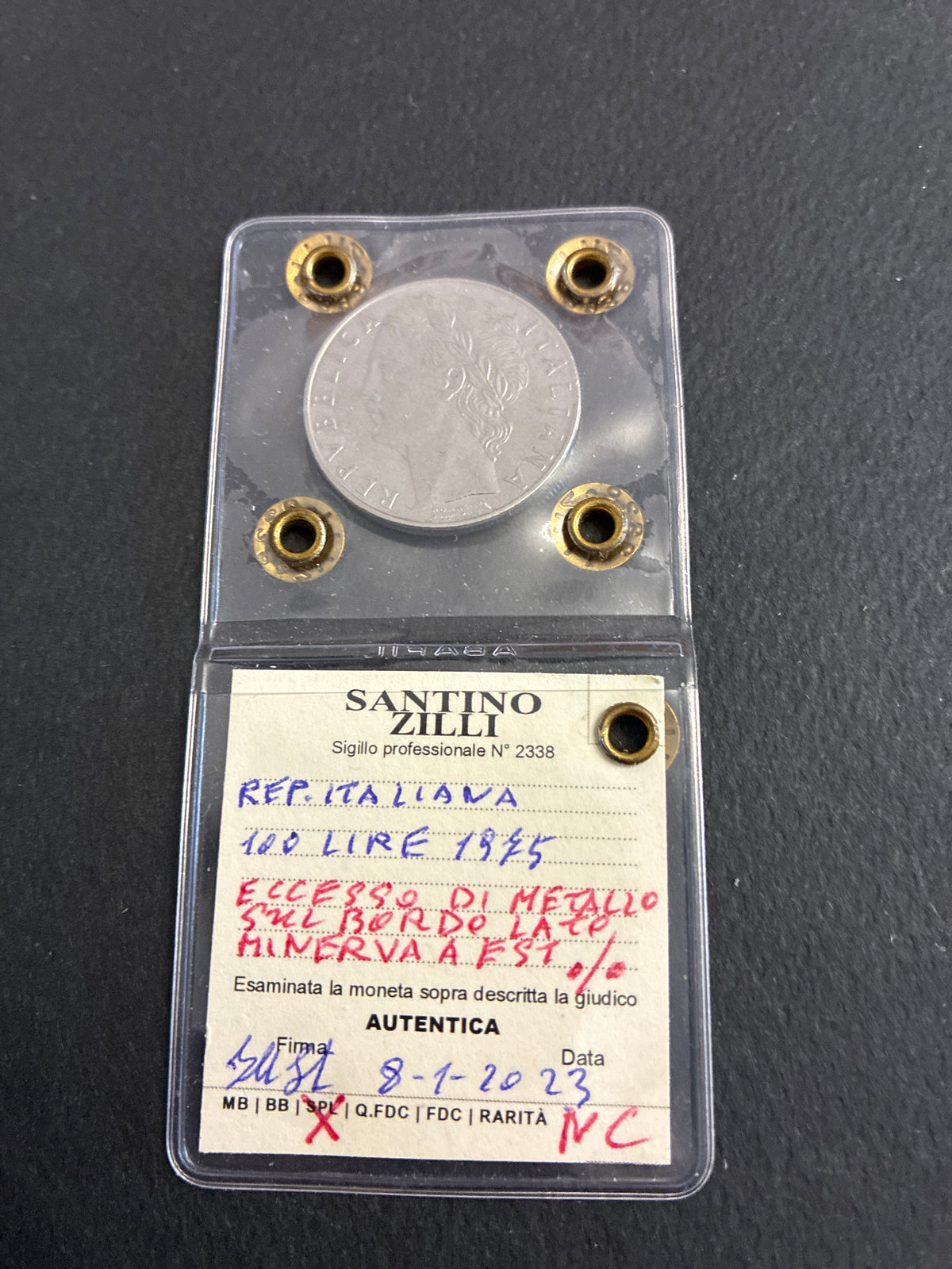 100 Lire 1975 Minerva con Eccesso di Metallo sul Bordo Periziata SPL