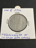 100 lire del 1974 Minerva variante errore di conio mezzalunetta in incuso sotto collo