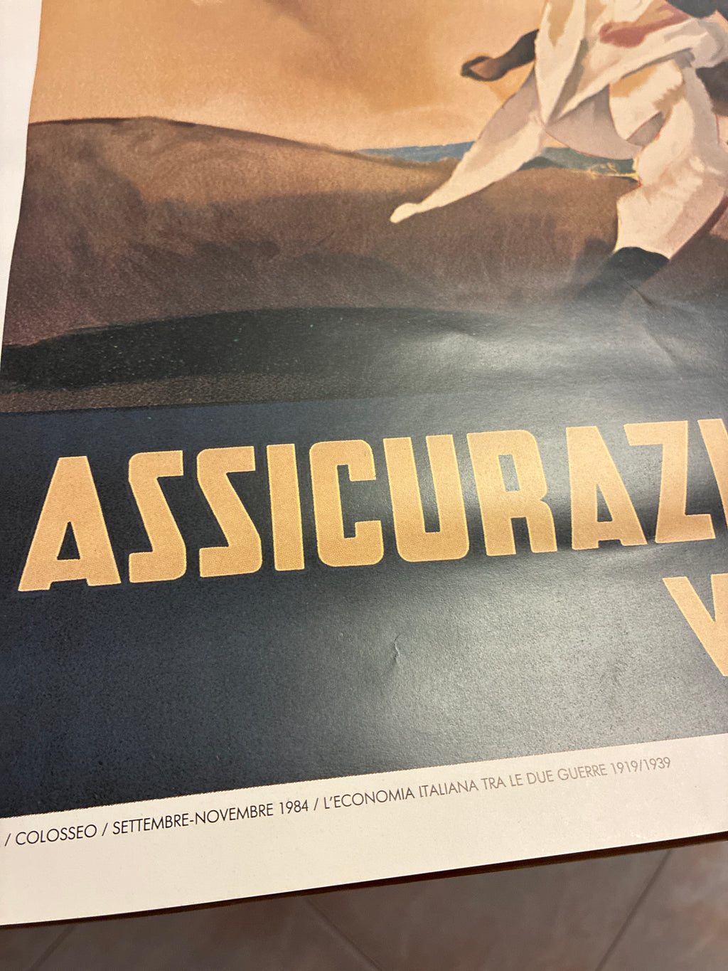 Manifesto mostra "L'economia italiana tra le due guerre" Colosseo Roma 1984 - Assicurazioni Generali Dudovich